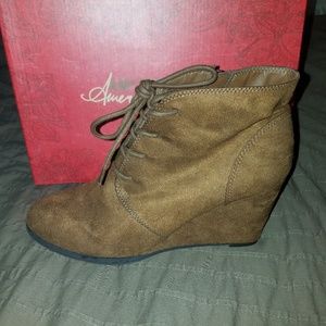 Brown wedge booties